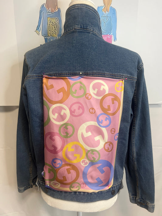 Colorful Monogram  on blue denim jacket.